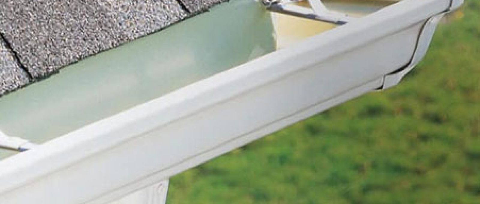 Gutter services in New Jersey – All Pro 1 installation team working on residential home
